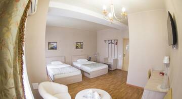 Семейный двухместный номер бизнес-класса с 2 отдельными кроватями в Гостинице Уют